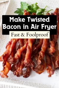 Crispy twisted bacon on a white plate with parsley. The image state Make Twisted Bacon in Air Fryer Fast & Foolproof.